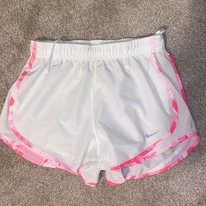 White Nike shorts liked in pink